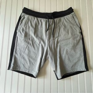 Under Armour grey/black athletic style shorts Preowned like new